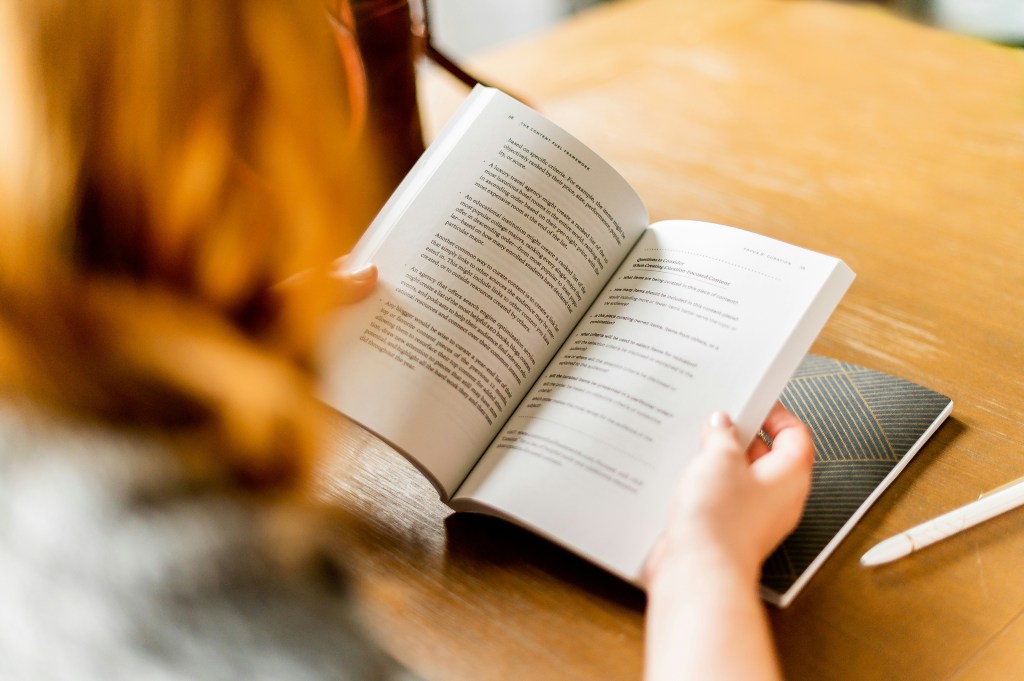 A student reading a book